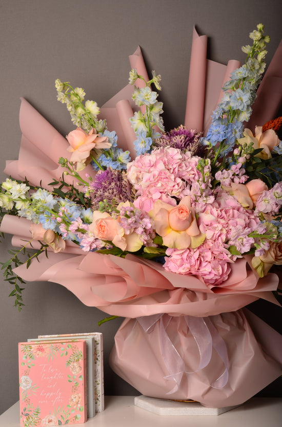 Pink and blue flowers bouquet