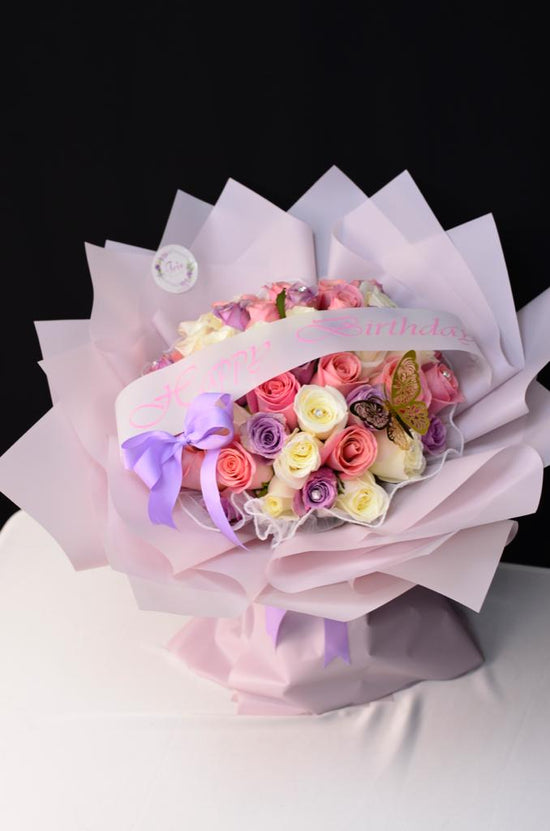 Pink, purple & white rose bouquet
