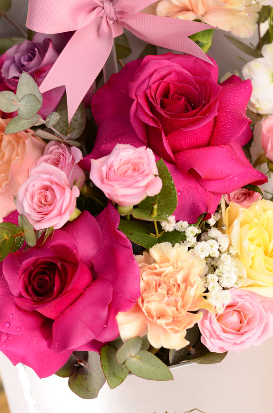 Pink flowers and balloon in Box