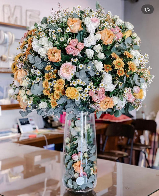 Orange, pink and white flowers vase