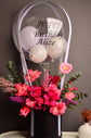 Pink flowers box with balloon