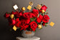 Red flowers basket with chocolate