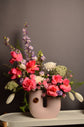Pink and purple flowers vase