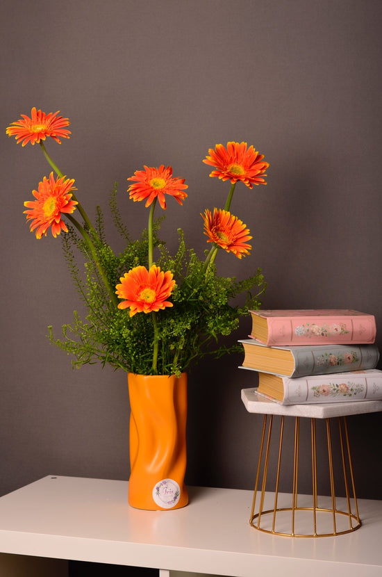 Orange flowers vase