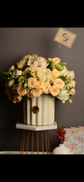 White and orange flowers vase
