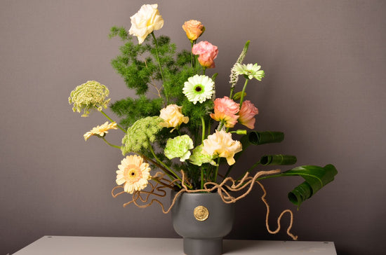 Green and orange flowers vase