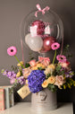 Blue and pink flowers box with balloon