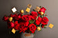 Red flowers basket with chocolate