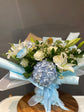 Blue and white flowers bouquet