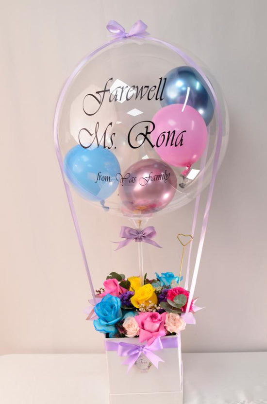 Blue ,yellow and pink flowers with balloons