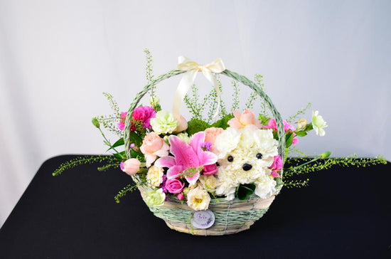Pink and white flowers basket