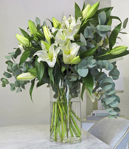 White lily vase