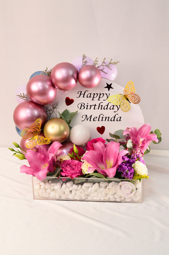 Pink flowers with balloons tray