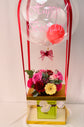 Pink and red flowers box with balloons & chocolate