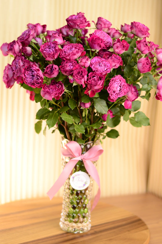 Fuchsia baby rose vase