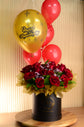 Red rose flowers box with helium balloon