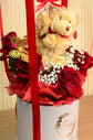 red rose, teddy bear in box