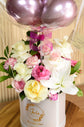 Pink and white rose with balloons in box