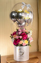 Pink flowers and balloon in Box
