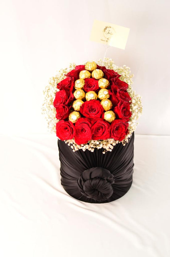Red rose with chocolate box