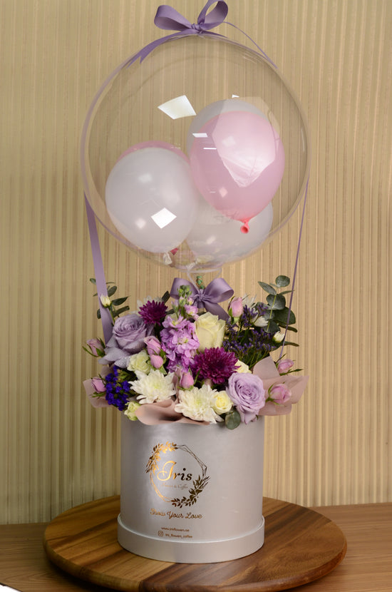 pink flowers with balloons